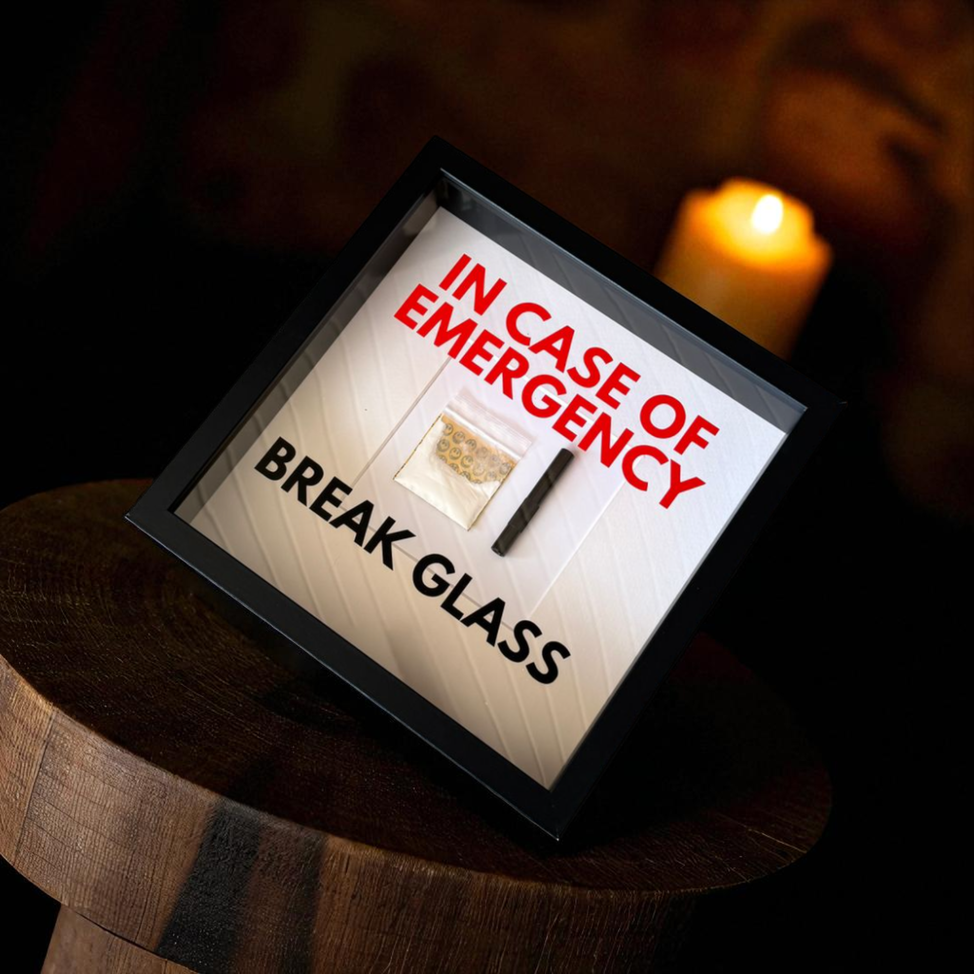"In Case of Emergency Break Glass" - mural with cocaine bags and drawing tubes black frame