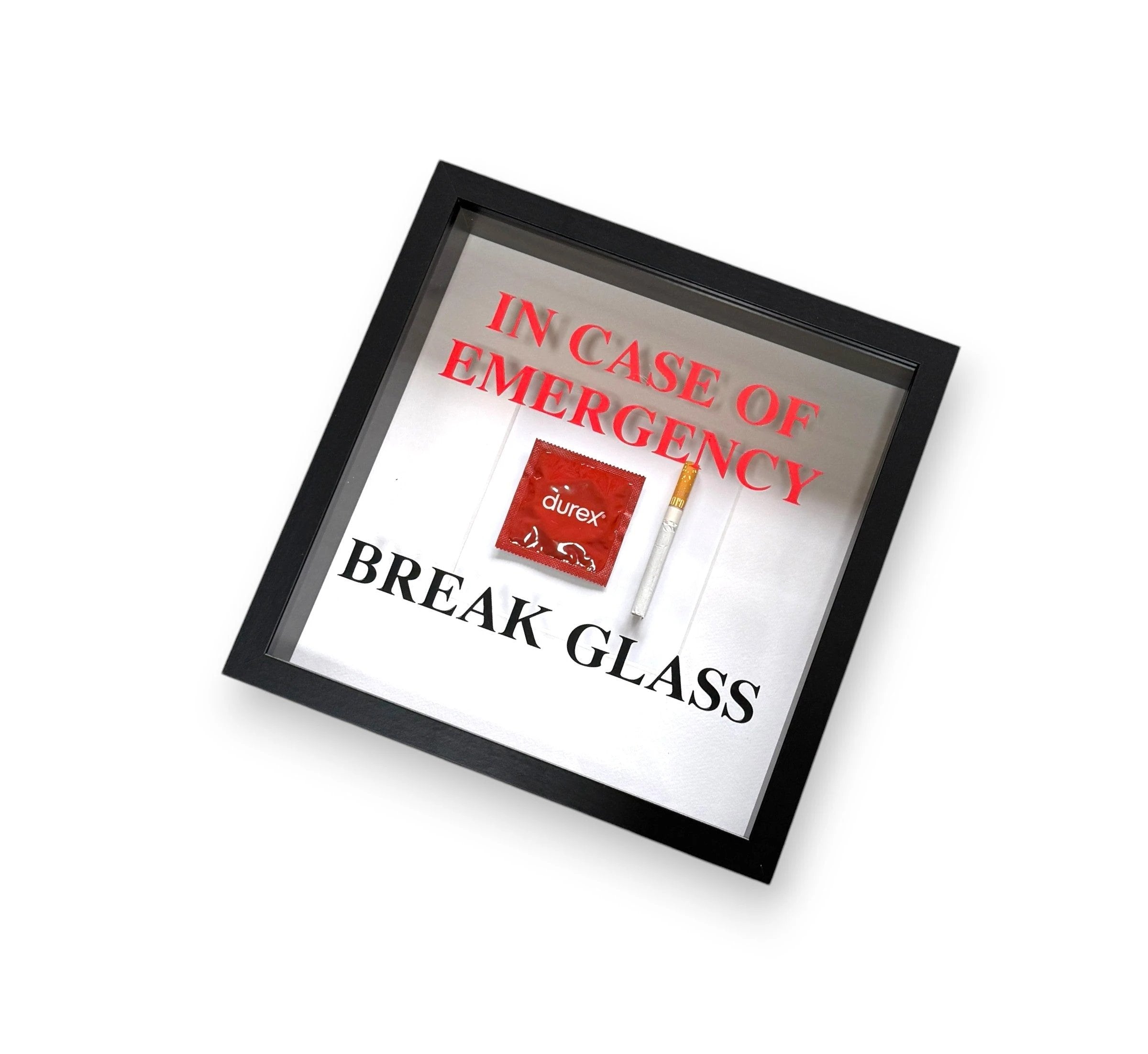 "In Case of Emergency Break Glass" – Wandbild mit Kondom/Zigarette schwarzer Rahmen - from DieBallerei