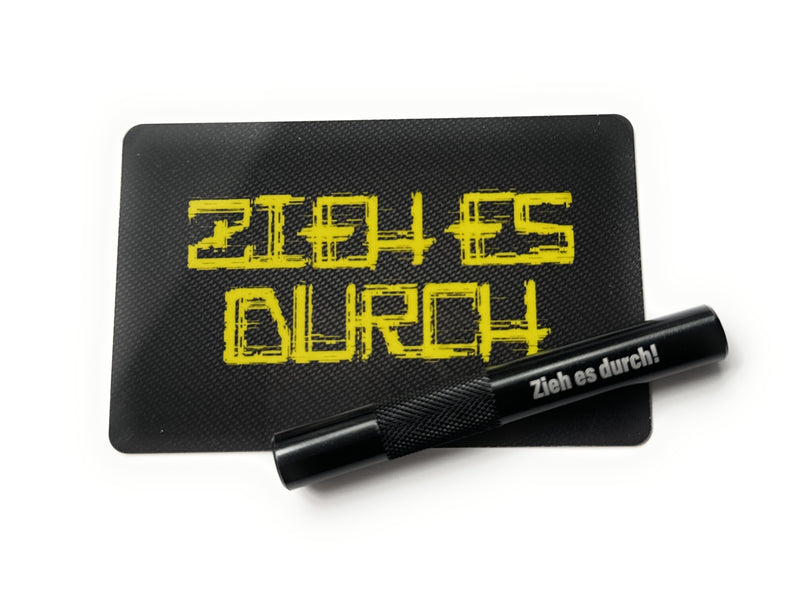 Aluminum tube set in black/ribbed (70mm) with laser engraving and hack card “Pull it through yellow”